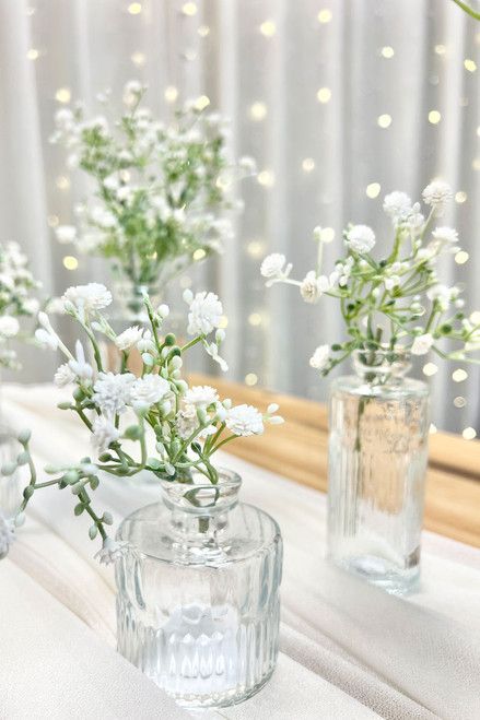 Multiple Clear Bud Vases with Faux Babys Breath Stems