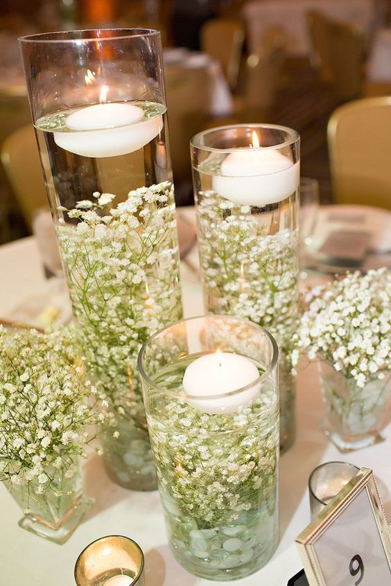 Floating candles with babys breath centerpiece